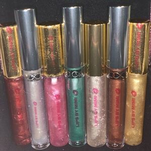 LIP GLOSS BUY ONE GET A FREE MINI LIP GLOSS.